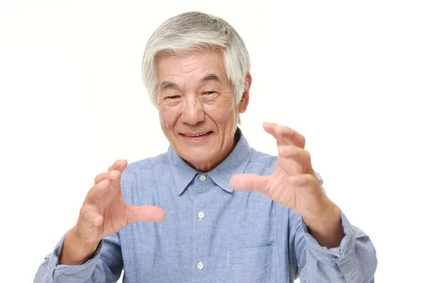 Senior Japanese man with supernatural power — Stock Photo, Image