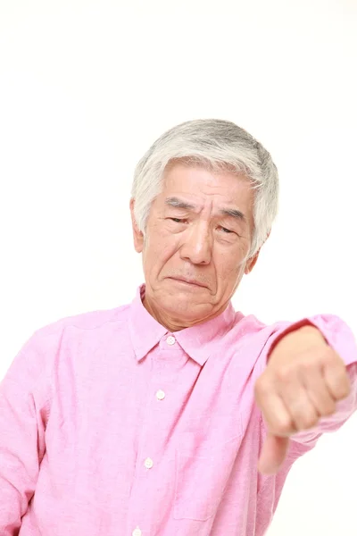 Senior japonés hombre con los pulgares hacia abajo gesto —  Fotos de Stock