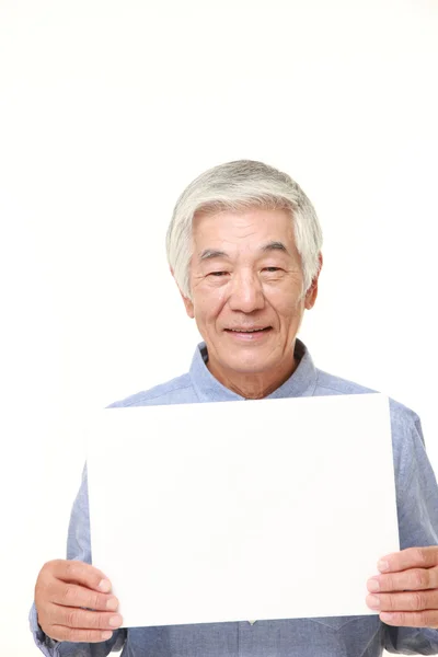 Senior japonés hombre con tablero de mensajes —  Fotos de Stock