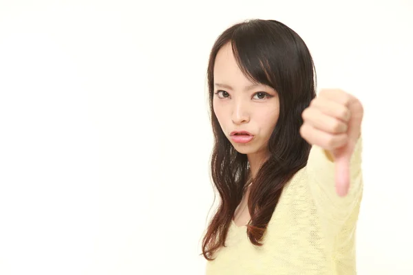 ジェスチャを親指で日本の若い女性 — ストック写真