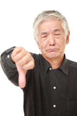 başparmak aşağı hareketi ile üst düzey Japon adam