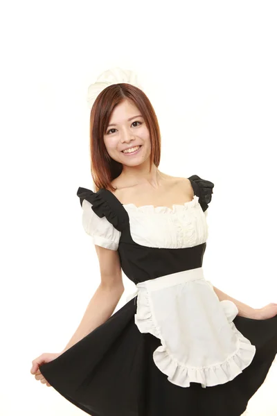 Junge Japanerin posiert im französischen Dienstmädchenkostüm — Stockfoto