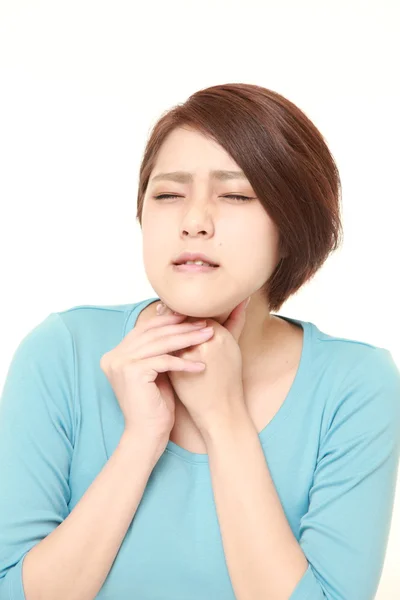 Joven japonesa mujer tener garganta dolor —  Fotos de Stock