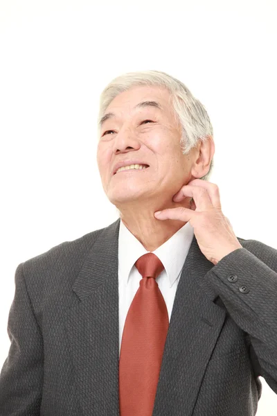 Senior japonais homme d'affaires se gratter le cou — Photo