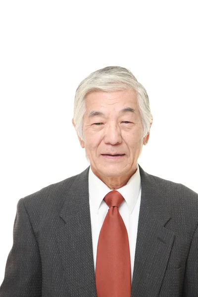 Senior Japanese businessman in a good mood — Stock Photo, Image