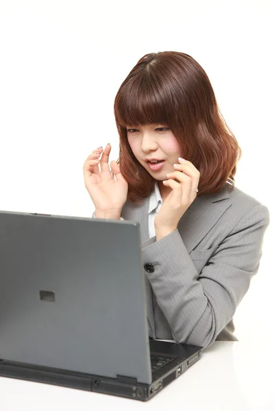 Young Japanese businesswoman shocked — Stock Photo, Image