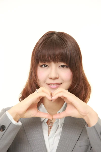 Japanse zakenvrouw met hart — Stockfoto