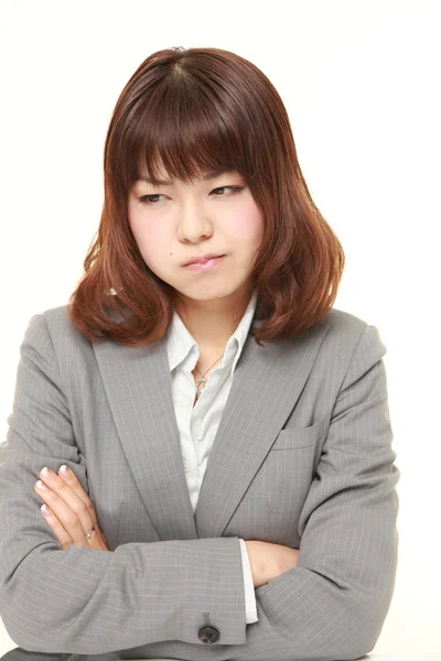 Joven japonesa mujer de negocios de mal humor — Foto de Stock