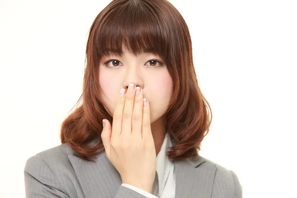 Giapponese businesswoman making il speak no evil gesture — Foto Stock