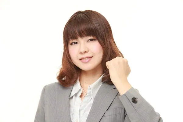 Young Japanese businesswoman in a victory pose — Stock Photo, Image