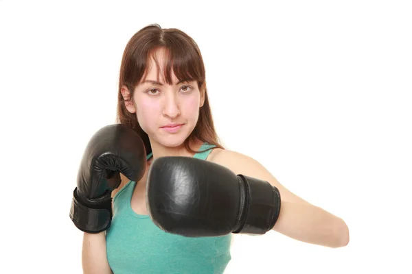 Female boxer throws a left hook — Stock Photo, Image