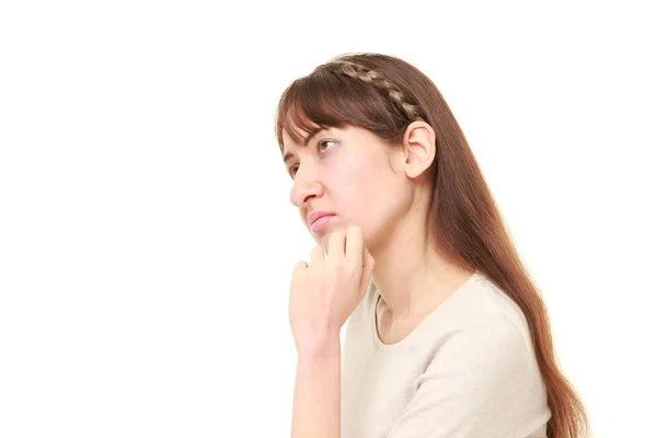 Young woman worries about something — Stock Photo, Image