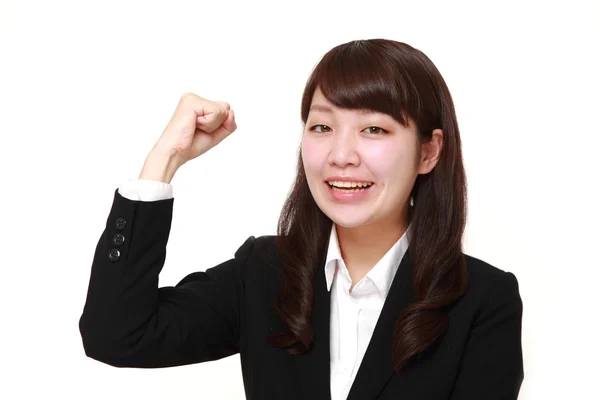 Joven mujer de negocios japonesa en una pose de victoria —  Fotos de Stock
