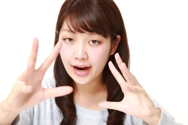 Young Japanese woman with supernatural power — Stock Photo, Image