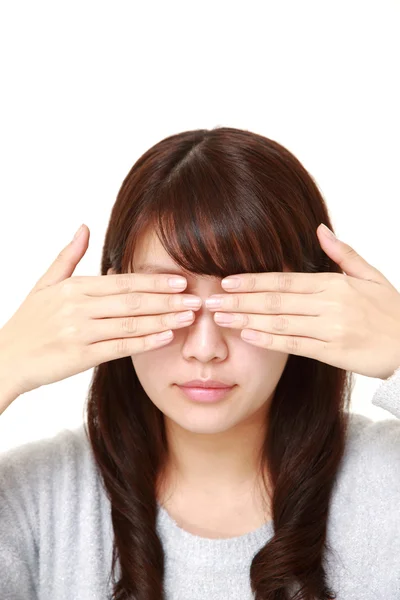 Woman covering her face with hands — Stock Photo, Image