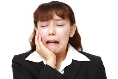Asya işkadını diş ağrısı muzdarip