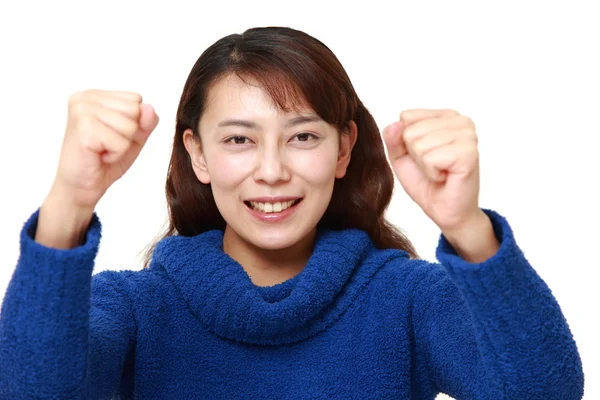 Aziatische vrouw in een overwinning pose — Stockfoto