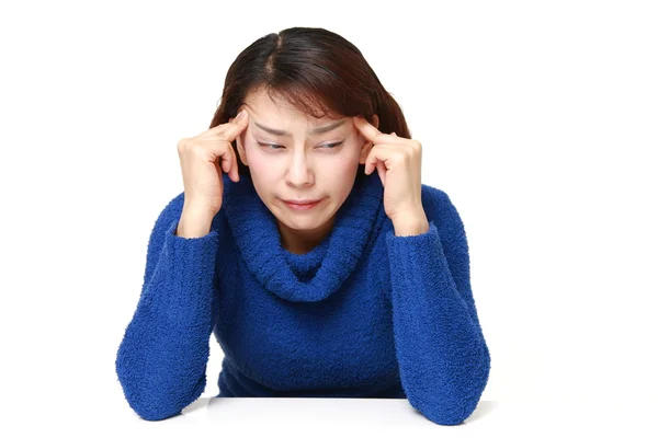 Woman suffers from headache — Stock Photo, Image