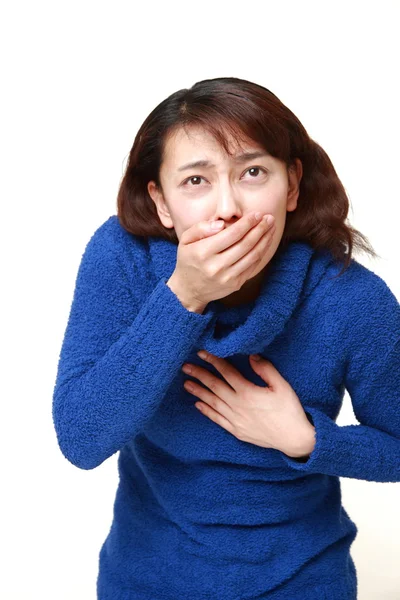 Asiática mujer siente como vomitar —  Fotos de Stock