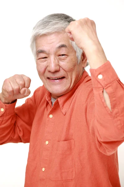 Senior Japanse man in een overwinning pose — Stockfoto