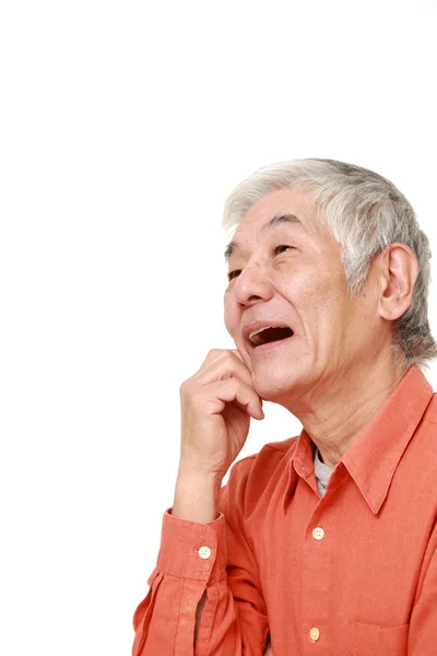Старший Японська людина мріє в його майбутнє — стокове фото