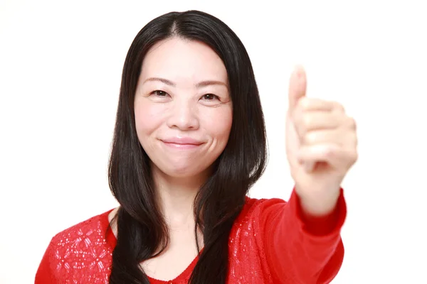 日本现代女性的手势竖起大拇指 — 图库照片