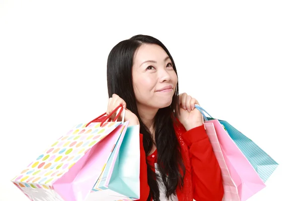 Mujer japonesa con bolsas de compras —  Fotos de Stock