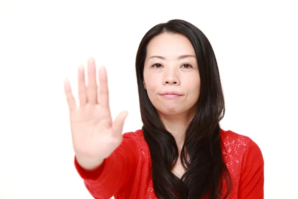 Japonês mulher fazendo parar gesto — Fotografia de Stock