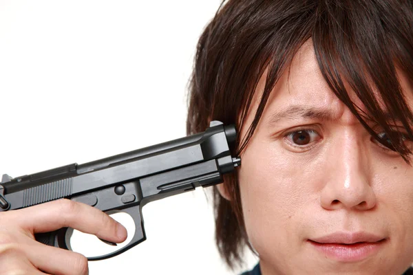 Japanese man going to shoot himself — Stock Photo, Image