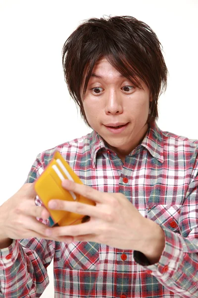 Pobre joven japonés hombre — Foto de Stock