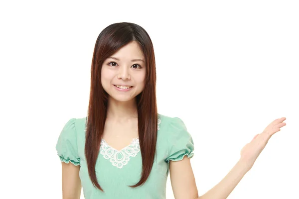 Bemutató és bemutató valami fiatal japán nő — Stock Fotó