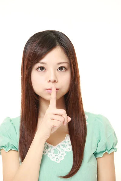 Jeune femme japonaise whith silence gestes — Photo