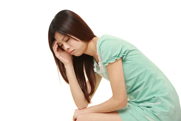 Jovem mulher japonesa deprimida — Fotografia de Stock