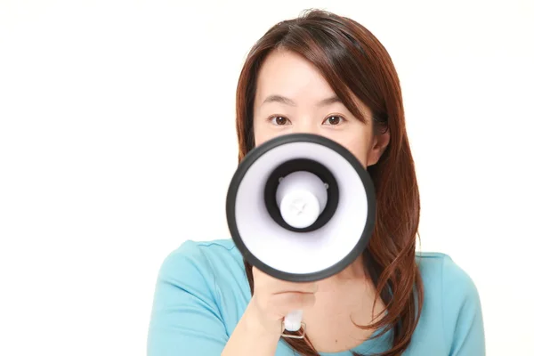 Mujer japonesa de mediana edad con megáfono — Foto de Stock