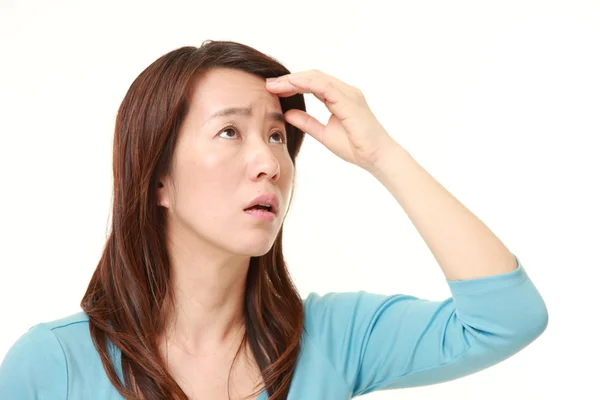 Middle aged Japanese woman has lost her memory — Stock Photo, Image