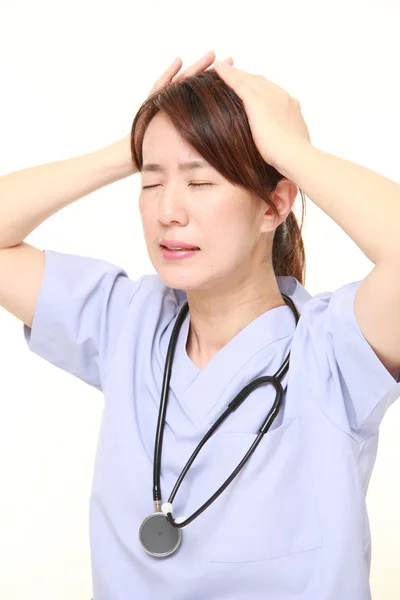 Japanese female doctor shocked — Stock Photo, Image