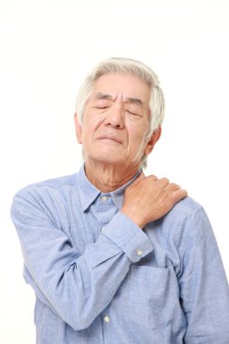 üst düzey Japon adam boyun ağrısı uğrar