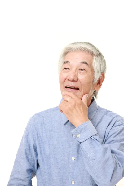 Senior japonés hombre soñando en su futuro —  Fotos de Stock