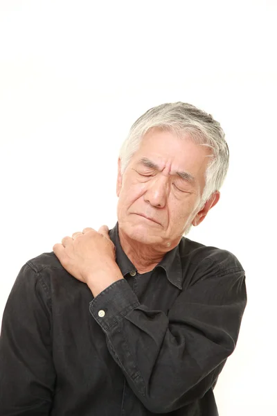 Homme japonais âgé souffre de maux de cou — Photo