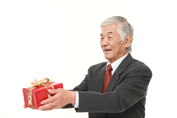 Senior japoński biznesmen podarunku — Zdjęcie stockowe