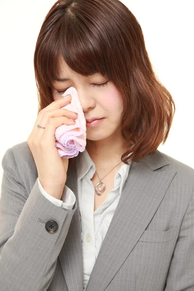 Young Japanese businesswoman cries — Stock Photo, Image