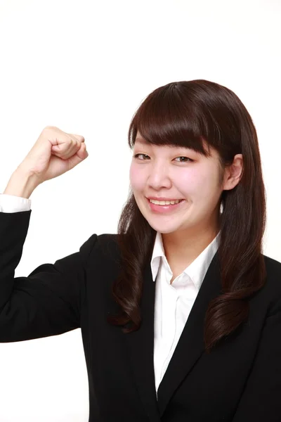 Joven mujer de negocios japonesa en una pose de victoria —  Fotos de Stock