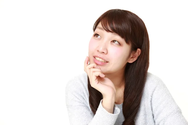 Young Japanese woman dreaming at her future — Stock Photo, Image