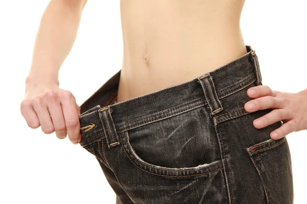 stock image woman in large pant after losing weight