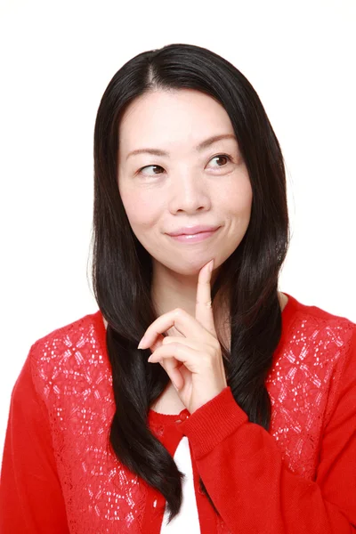 Japonês mulher pensa em algo — Fotografia de Stock