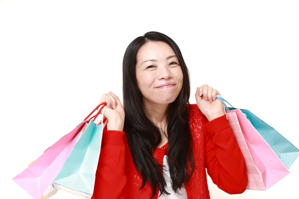 Mujer japonesa con bolsas de compras —  Fotos de Stock