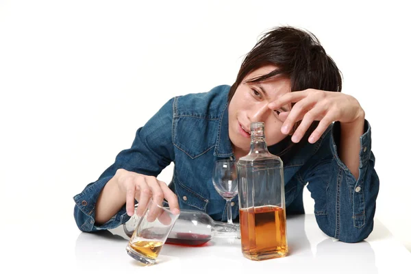 Young Japanese man drunk too much — Stock Photo, Image