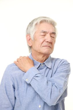 üst düzey Japon adam boyun ağrısı uğrar