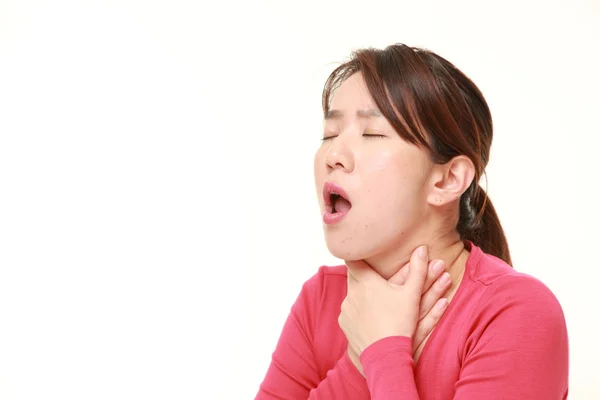 Middle aged Japanese woman having throat pain — Stock Photo, Image