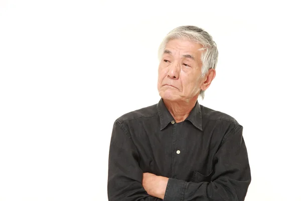 Senior Japanese man worries about something — Stock Photo, Image